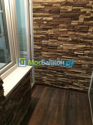 Отделка панорамной лоджии камнем