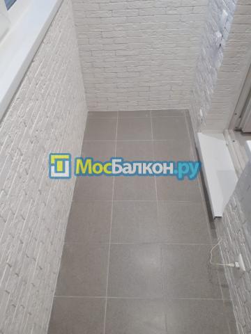 Отделка балкона декоративным камнем