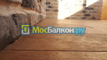 Ремонт лоджии с комбинированной отделкой камнем
