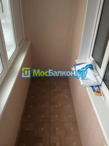Отделка балкона и лоджии пластиковыми ПВХ панелями в Мытищах от компании МосБалкон